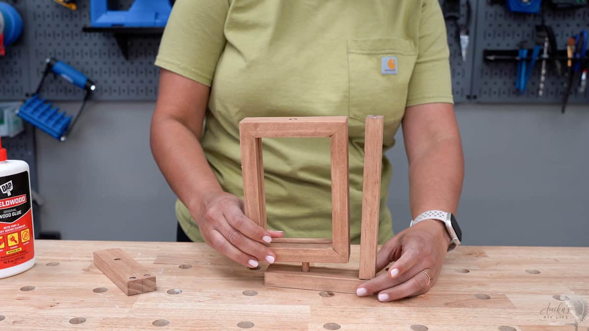 Anika assembling the DIY rotating Picture Frame
