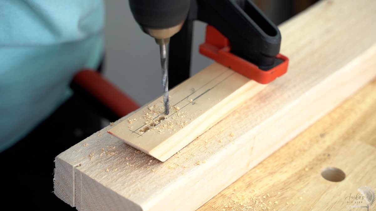 making starter holes in the side of the frame