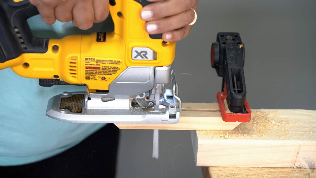 Cutting the slot in the side fo the frame using a jigsaw