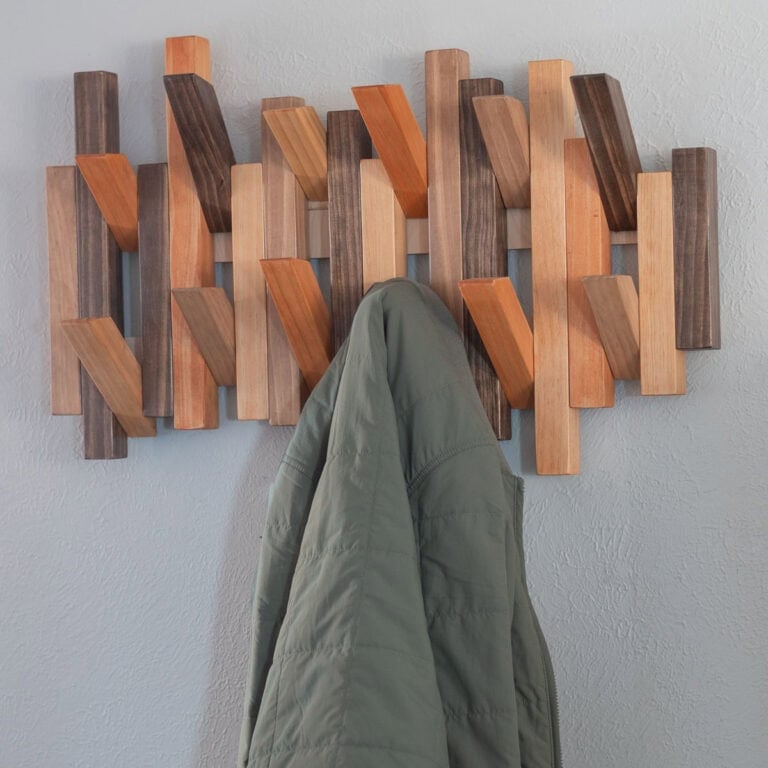 Learn how to make a DIY modern coat rack with this step-by-step tutorial! Build a functional and stylish piano coat rack that doubles as wall art, perfect for any space.
