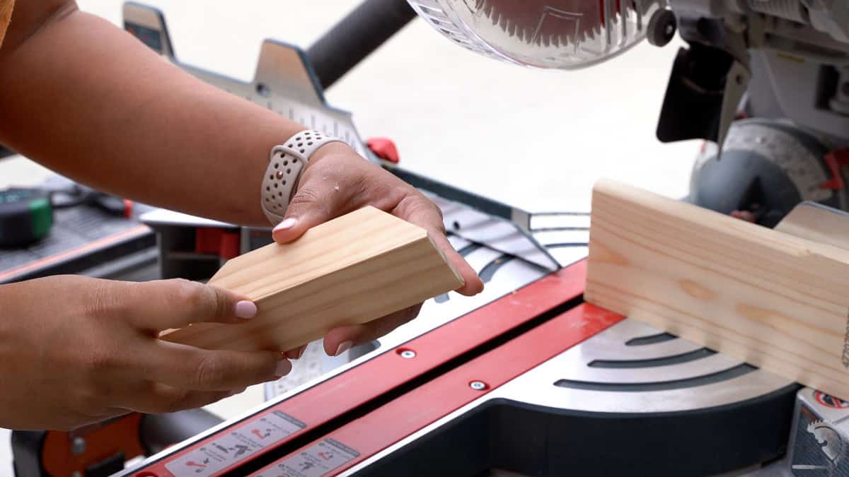 Cutting off the top edge of the hook for the piano rack