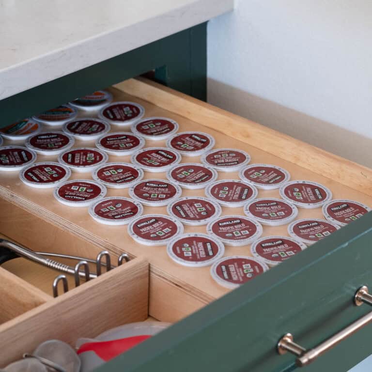 Transform your messy coffee drawer with this easy DIY K-Cup drawer organizer tutorial! Learn how to organize coffee pods using plywood and basic tools in just a few hours.