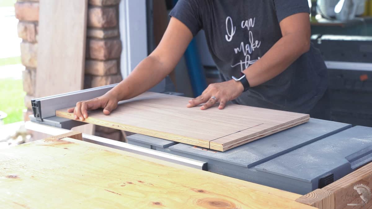 Cutting a board on the table saw