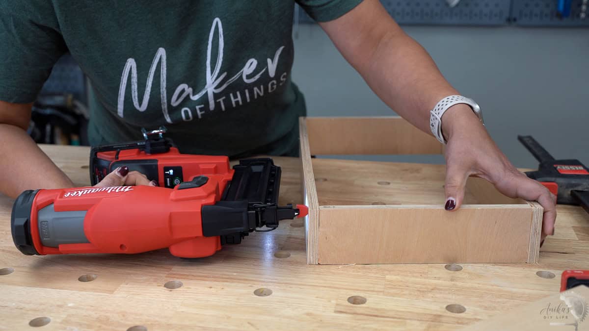 Attaching boards to build a box using a brad nailer