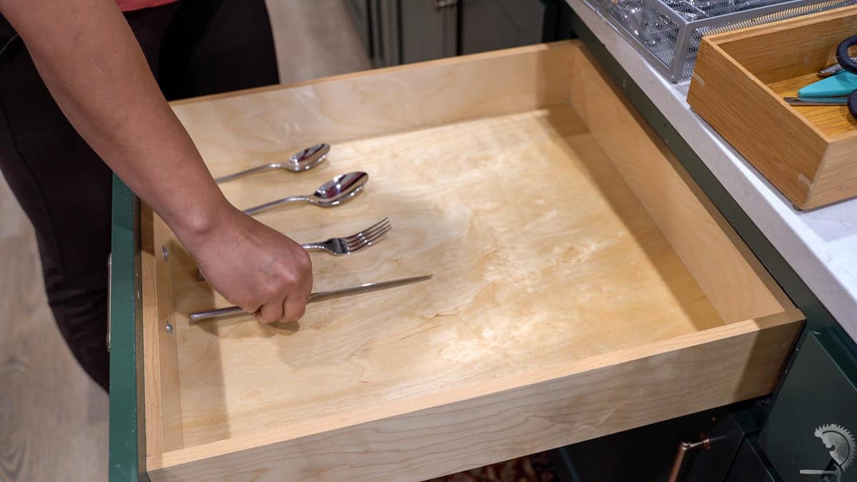 planning out the kitchen drawer for a wood organizer DIY
