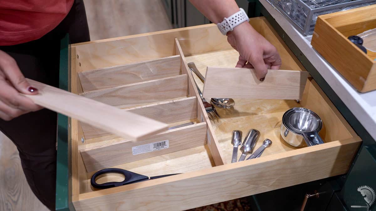 testing the fit of the boards for the DIY drawer organizer