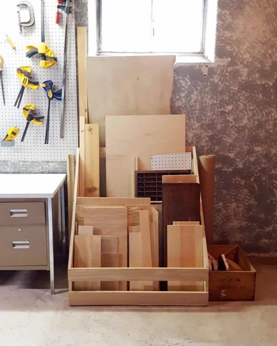 Scrap wood rack next to a workbench
