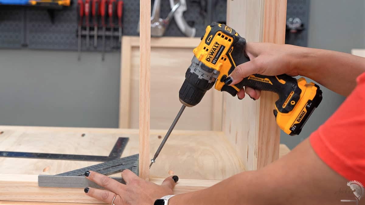 Attaching dividers to the sides of the dresser