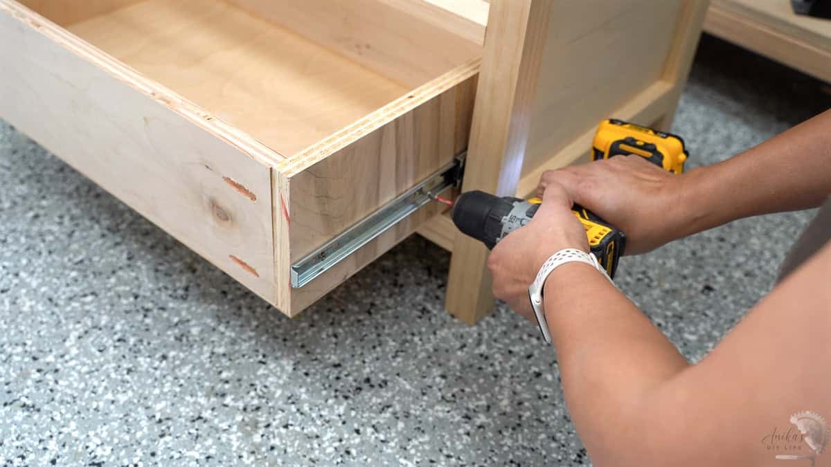Installing the drawers in the dresser