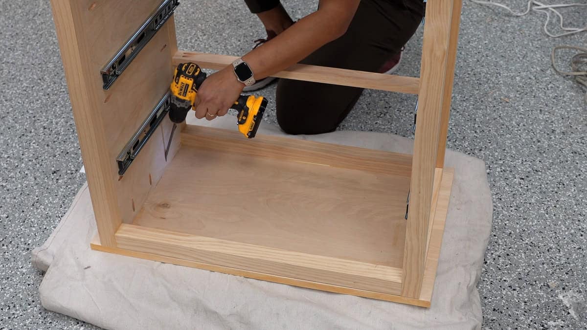 Attaching the top to the dresser frame using pocket hole screws