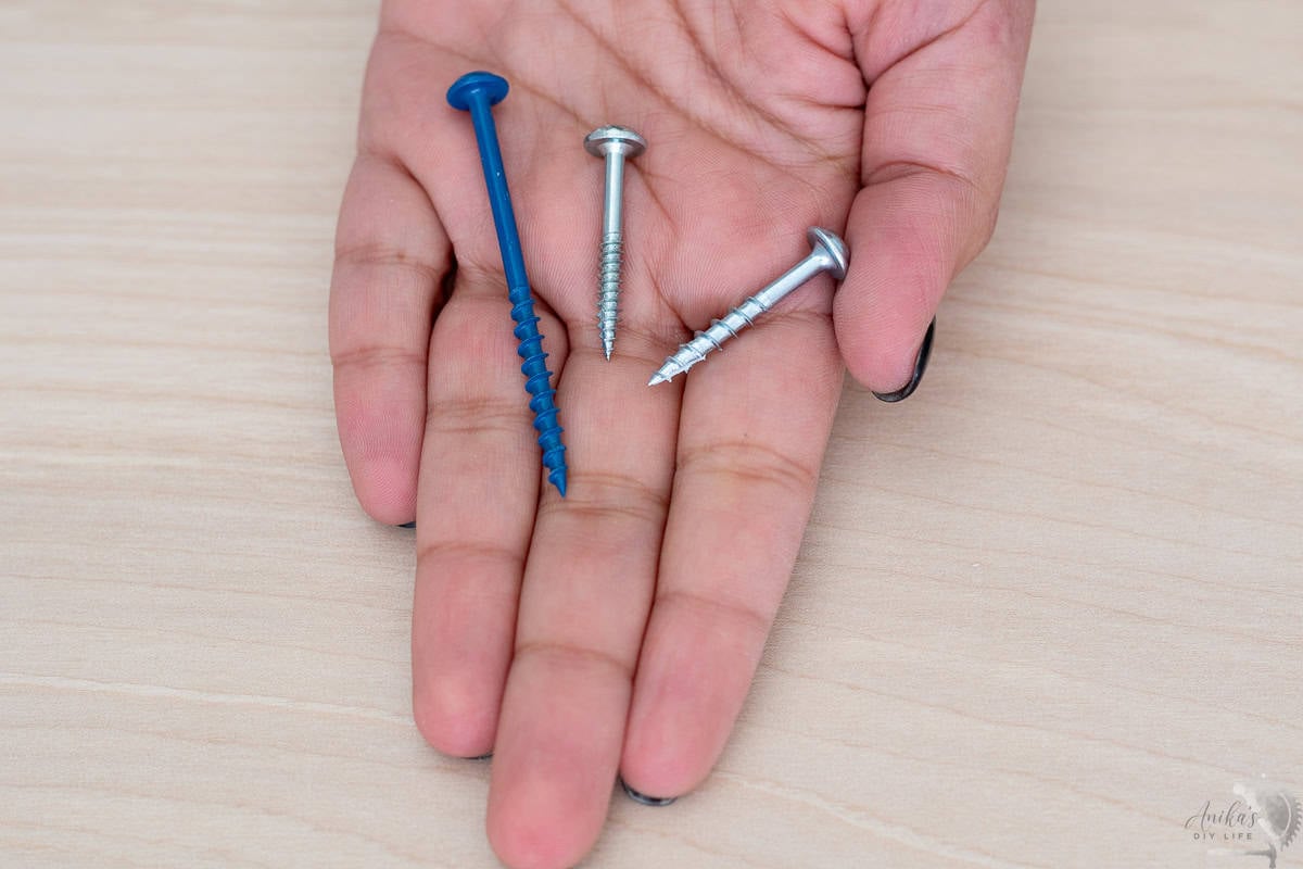 hand holding various types of pocket hole screws