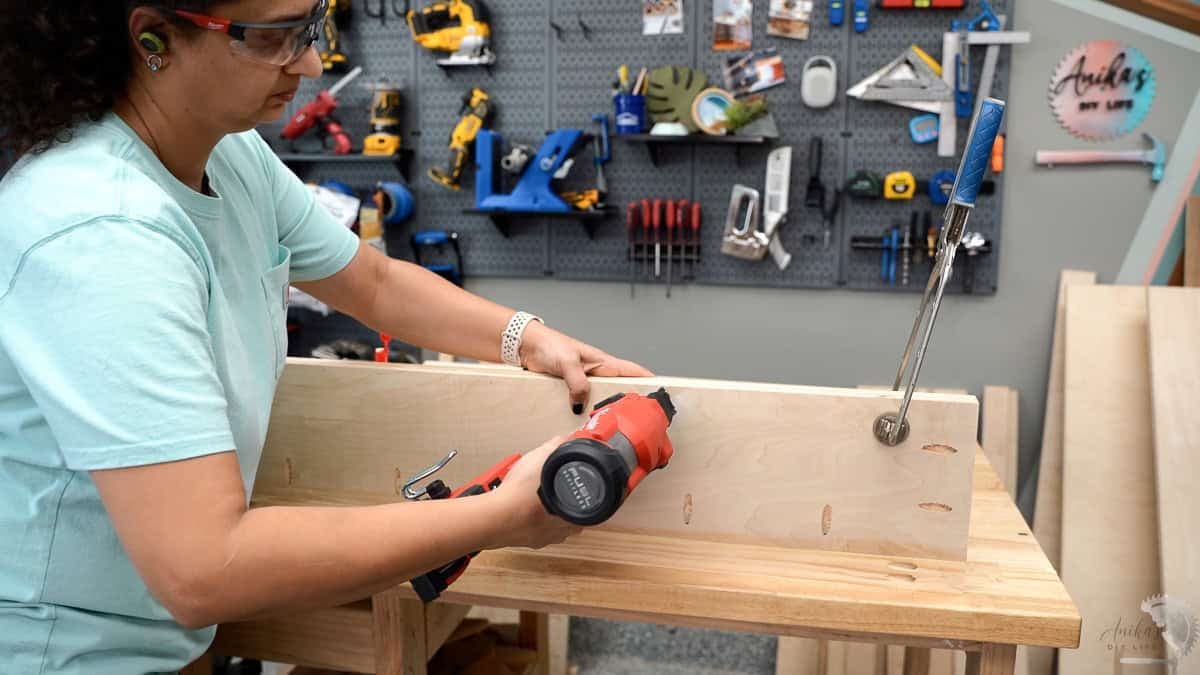 Attaching 1x2 trim to the top using a nail gun