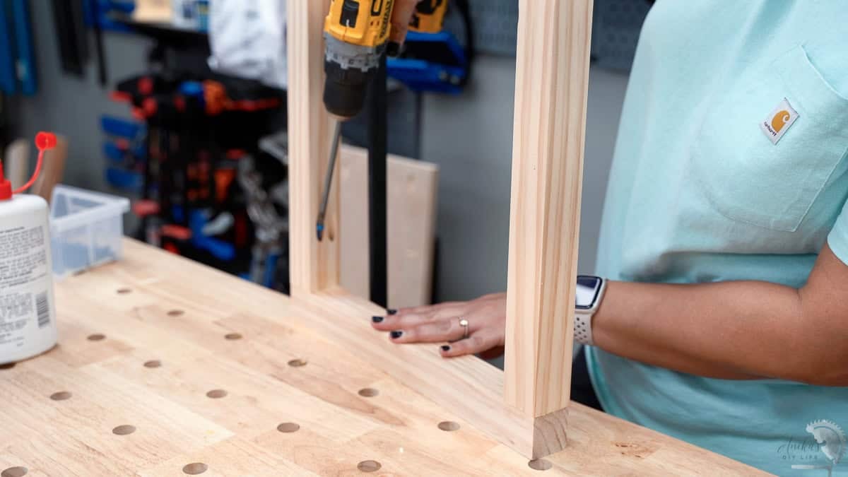 Attaching the 2x2 boards for the legs using pocket hole screws