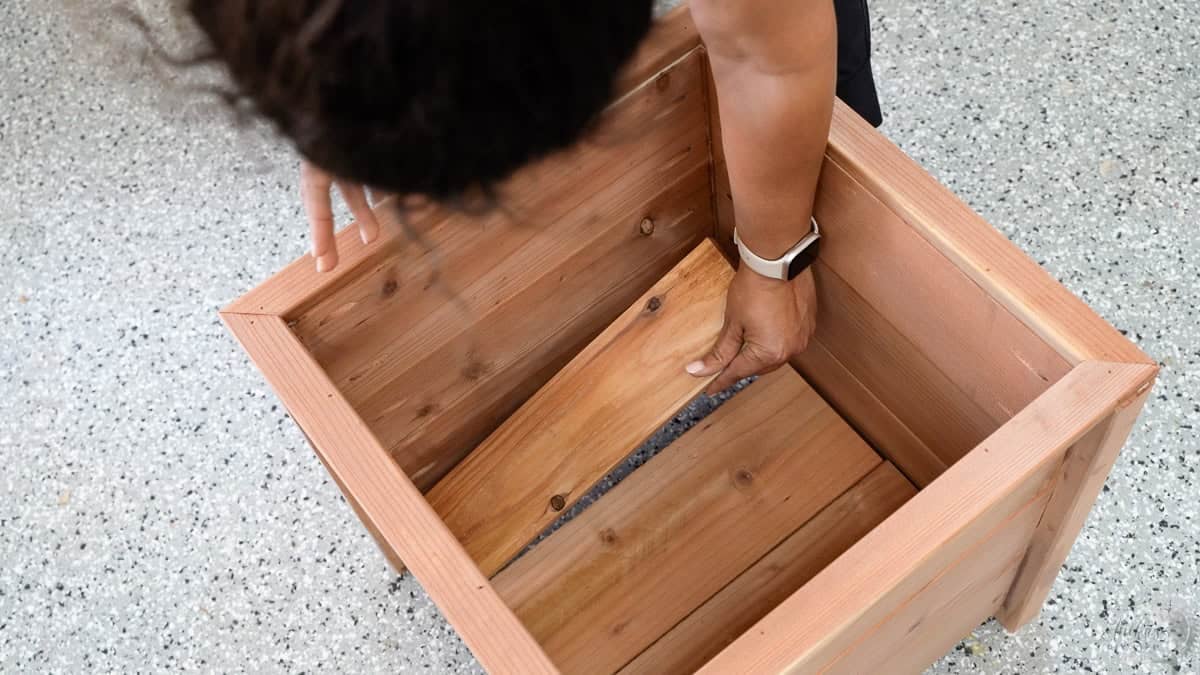 Adding boards at the bottom of the planter