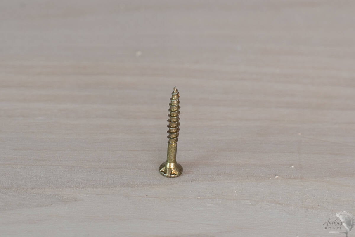 Close up of the underside of the head of a self countersinking screw.