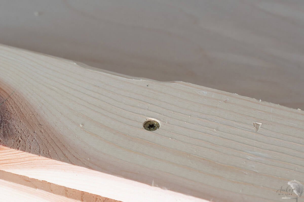 Countersunk screw in a wood board
