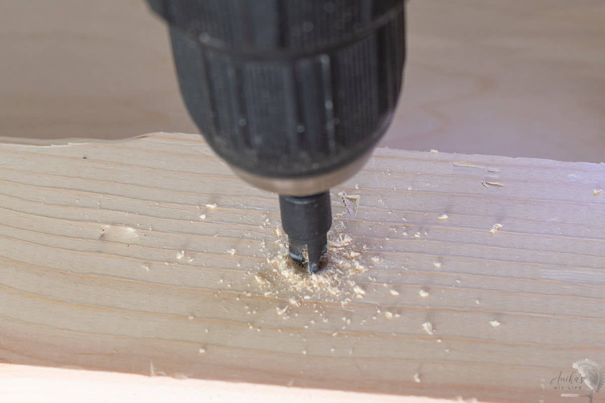 Making a countersunk hole using a countersinking bit.