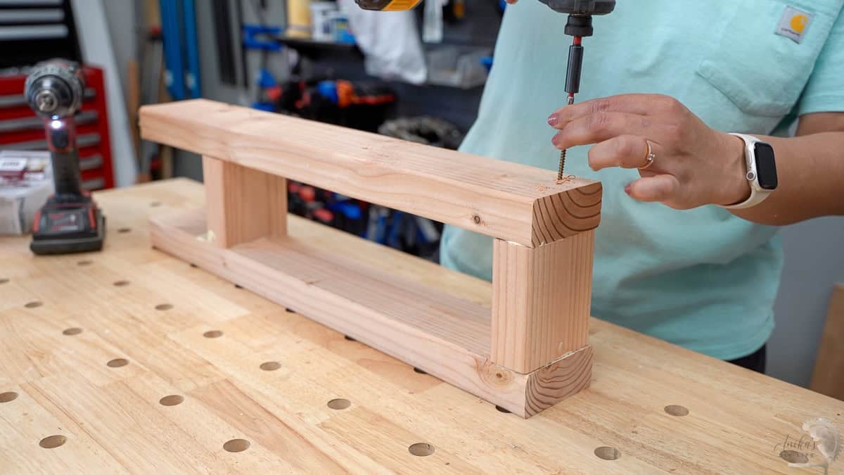 Building the support frame using 2x4 boards and wood screw