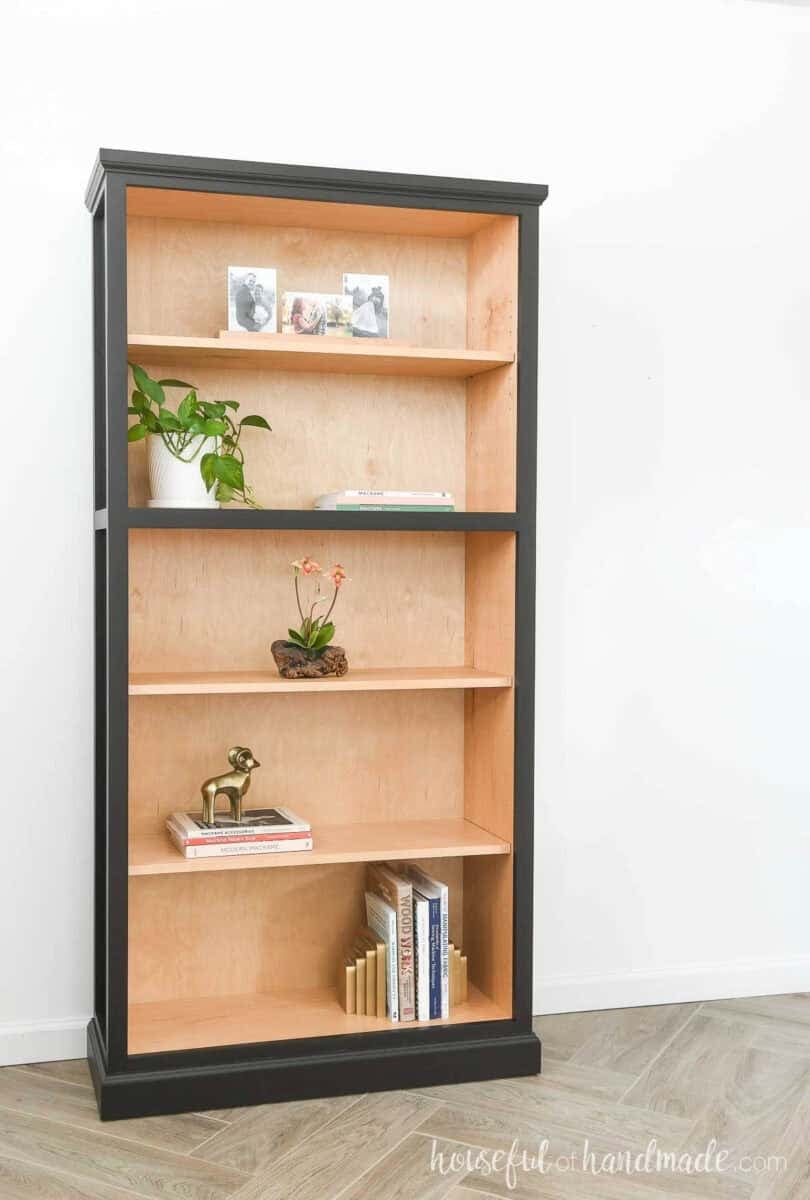 Classic style DIY bookcase with natural finish inside and painted black outside